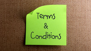 Sticky note with Terms and conditions written on it