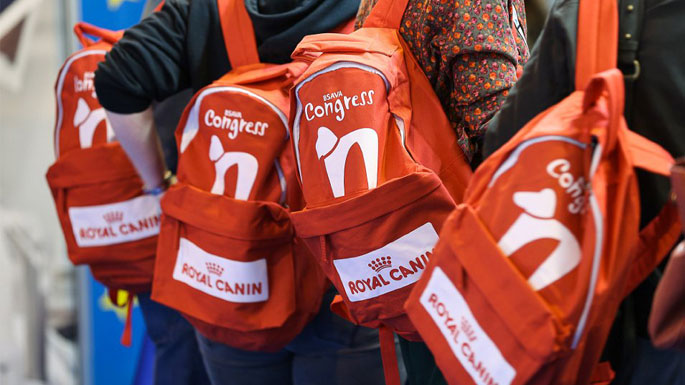 Four BSAVA Congress delegate red backpacks, sponsoredby Royal Canin