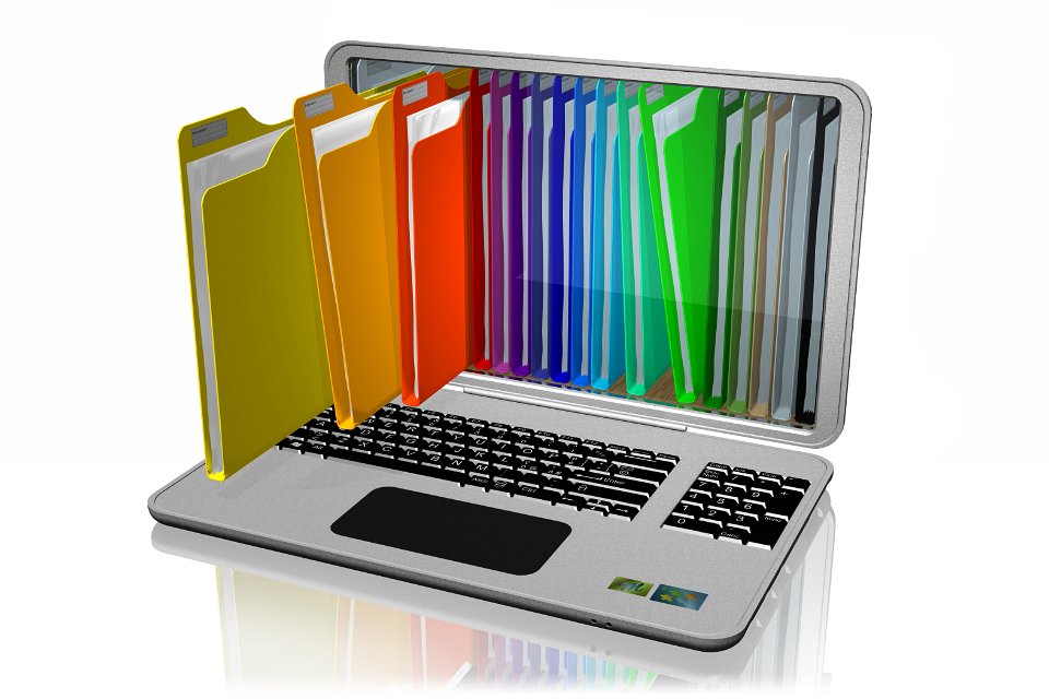 Illustration of a laptop with different coloured card folders appearing to come out of the screen